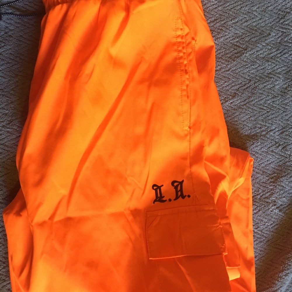 Orange wind pants